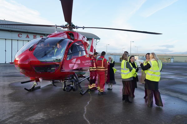 NatWest Cymru Regional Board clinicians and Wales Air Ambulance staff during a base visit at Cardiff Heliport