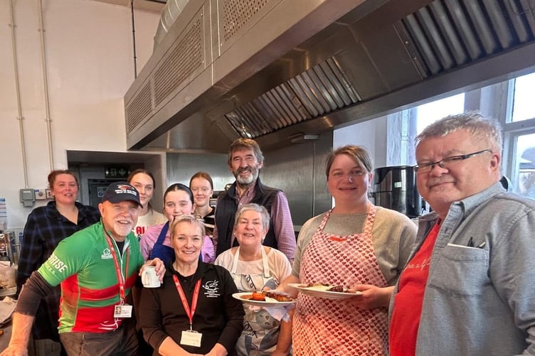 Wales Air Ambulance volunteers Neil and Nan Marsh supporting the event at Canolfan y Fron, Caernarfon (January 2025)