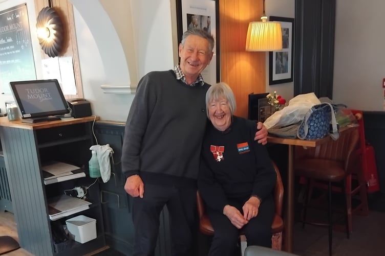 Tenby RNLI Shop volunteer David Morgan with Doreen Mortimer MBE at Tudor Mount Tenby