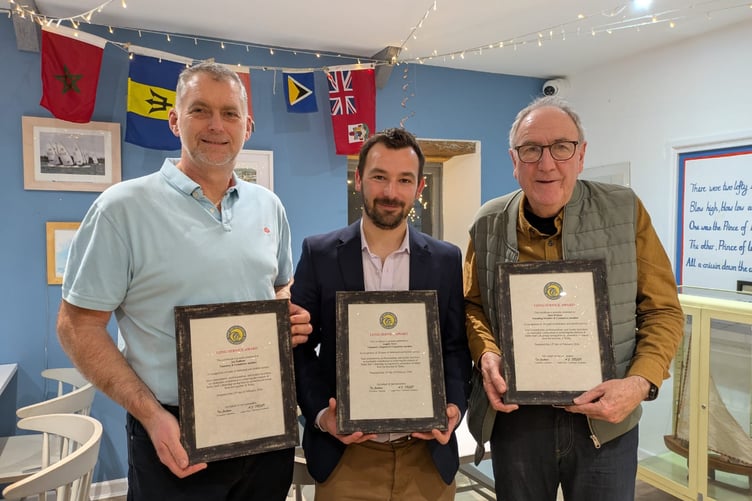 Tenby Surf Lifesavers Ian Badham, Angelo Fecci and Jules Rilston with their Long Service Awards