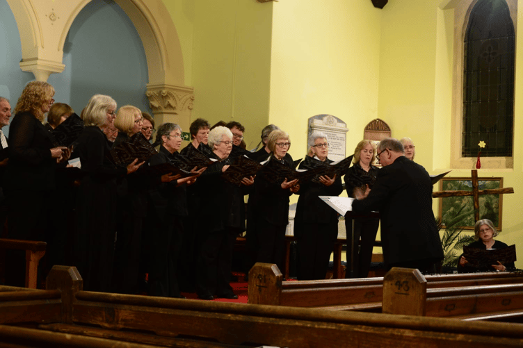 Quaynotes Choir performing in St Johns Church, Tenby