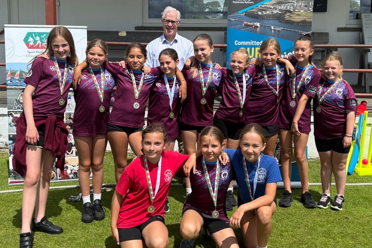 Saundersfoot CP School girls sporting sponsored sport t-shirts