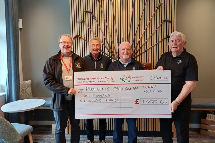 Pictured at the cheque presentation are Mike May, Wales Air Ambulance; Tenby Golf Club chairman Austin Davies; president Chris Beecher and president elect Tony Key.