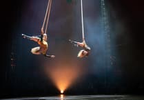 Twins Clem and Grace perform in 'Carnation' trapeze dance show