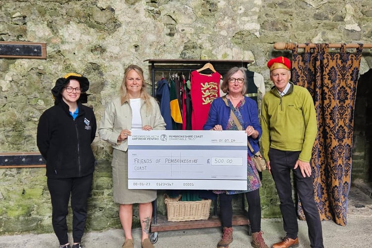 Pictured celebrating the £500 donation towards new historical costumes at Carew Castle are, from left, Elin Jenkins; Katie Macro, Director of the Pembrokeshire Coast Charitable Trust; Clare Dow, Chair of the Friends of the Pembrokeshire Coast National Park; and John Dow.